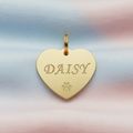Personalized pet ID tag, heart-shaped, gold metal with engraved pet name